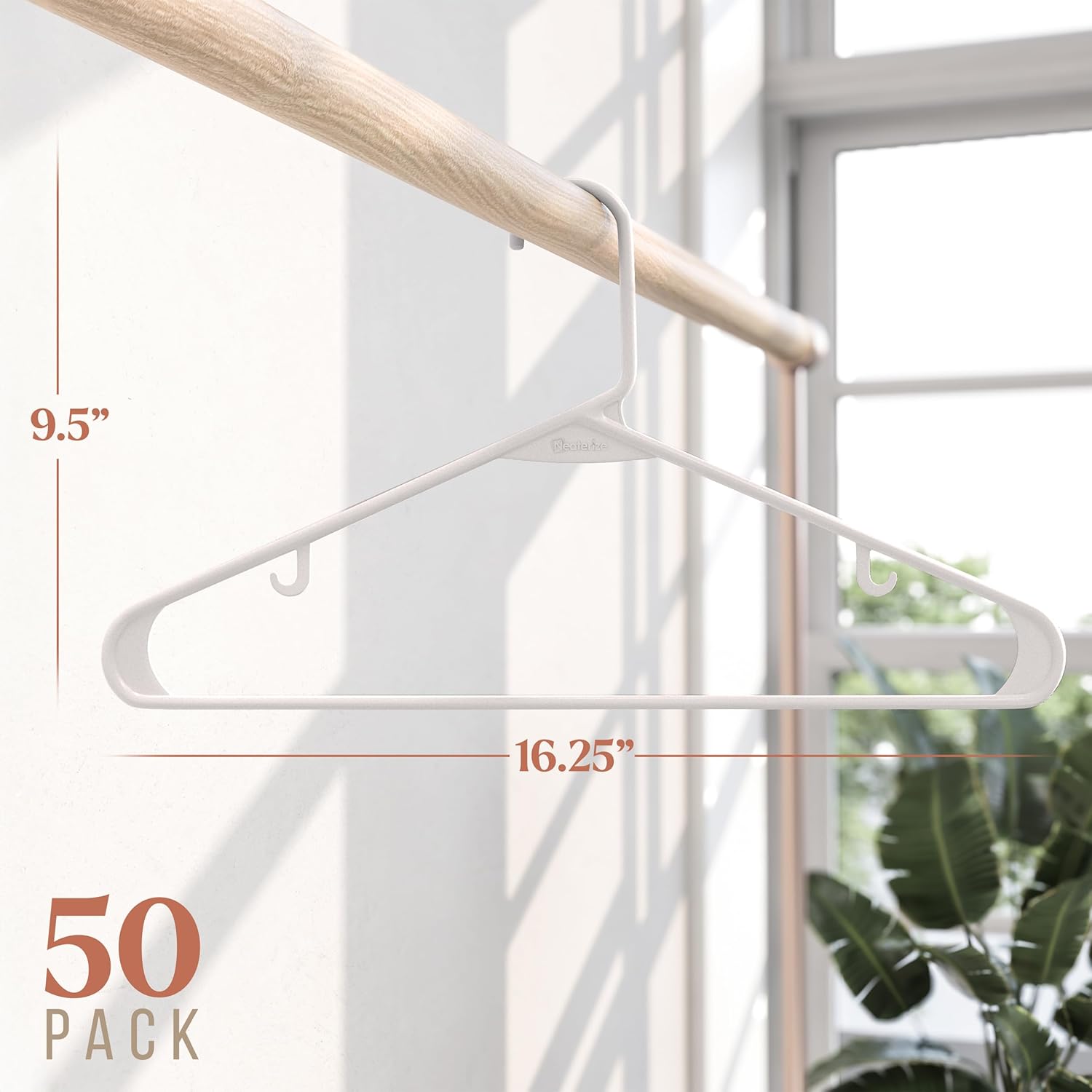 White Plastic Hangers — Versatile, space-saving hangers for your wardrobe; a must-have for a new home.