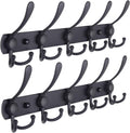 Wall-mounted coat rack—5 three-prong hooks.
