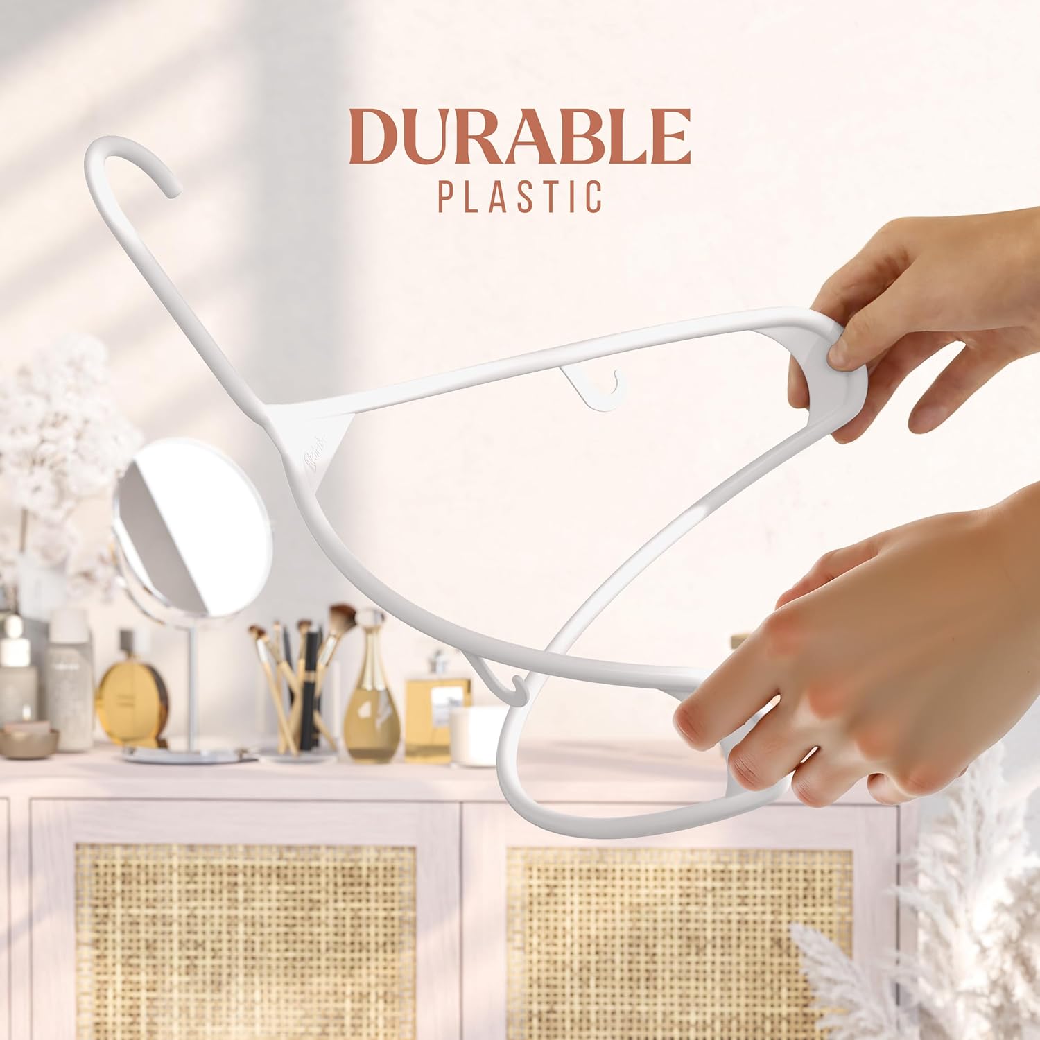 White Plastic Hangers — Versatile, space-saving hangers for your wardrobe; a must-have for a new home.